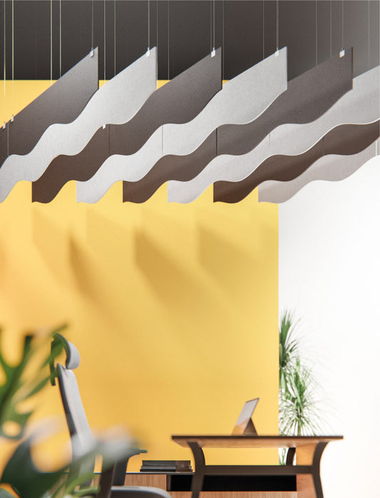 Suspended acoustic panels in the form of waves